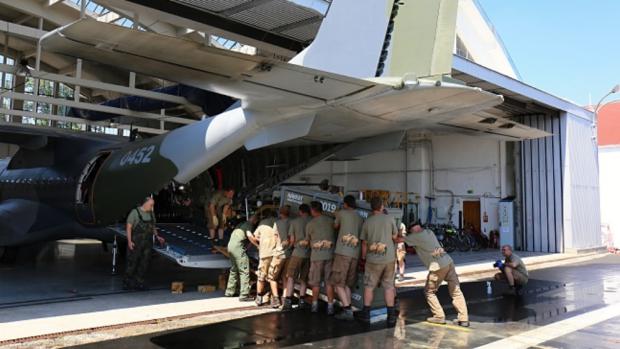 Loading the horses for the first time in Kbely. Then the plane had to almost completely unloaded and loaded again. 