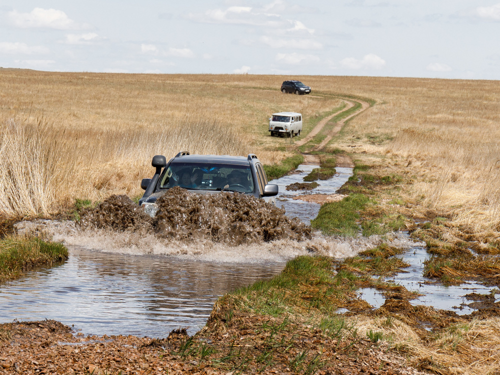 Long drives in the steppes were sometimes, to a greater or lesser extent, complicated by wetlands and watercourses. The cars managed this stream without too much difficulty. Photo Miroslav Bobek