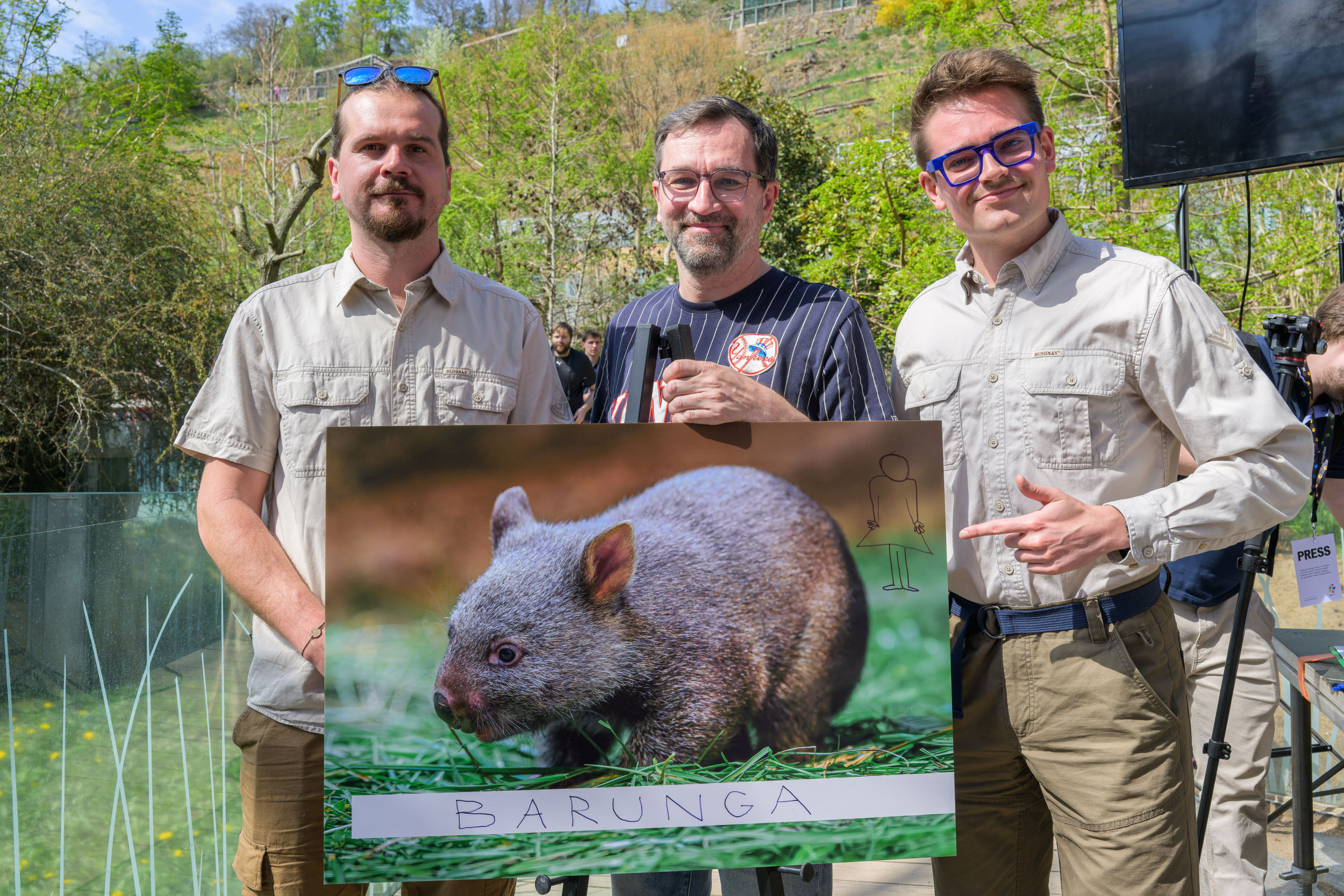 Introducing the little wombat. Pictured: keeper David Vala, actor and presenter Ondřej Sokol, and Prague Zoo’s spokesperson Filip Mašek. Photo: Petr Hamerník, Prague Zoo.
