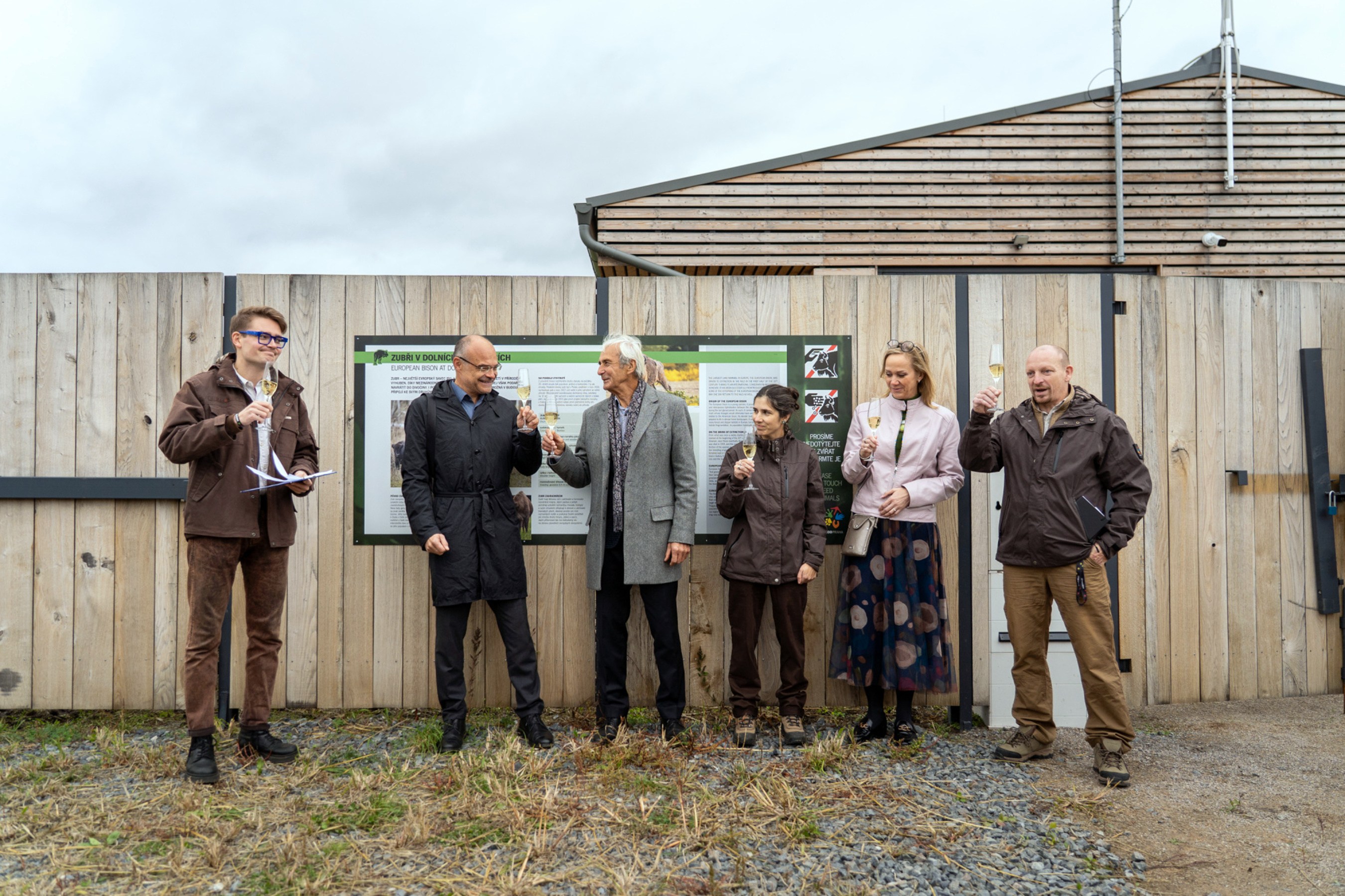 A toast to mark the opening of the new enclosure. From left: Prague Zoo press spokesman, Filip Mašek, Director of Prague City’s Environmental Protection Department, Štěpán Kyjovský, Mayor of Dolní Počernice, Zbyněk Richter, Prague Zoo’s curator of ungulates, Barbora Dobiášová, Prague’s Deputy Mayor for the Environment, Jana Komrsková, and Prague Zoo’s zoological deputy, Miroslav Machek. Photo Oliver Le Que, Prague Zoo